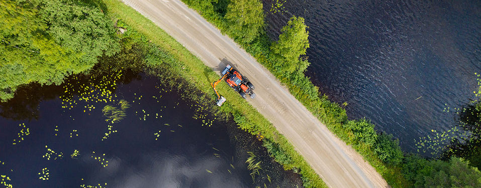 Aerial view of a tractor on a road